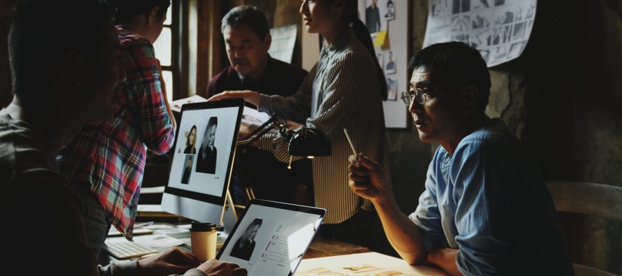 Group of creative people working and brainstorming together